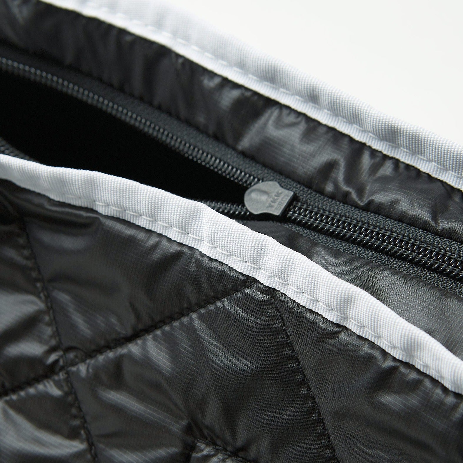 color: black ~ alt: GBY Ultralight - Quilted Gym Duffel Bag Inside Out Detail ~ info: Inside out detail