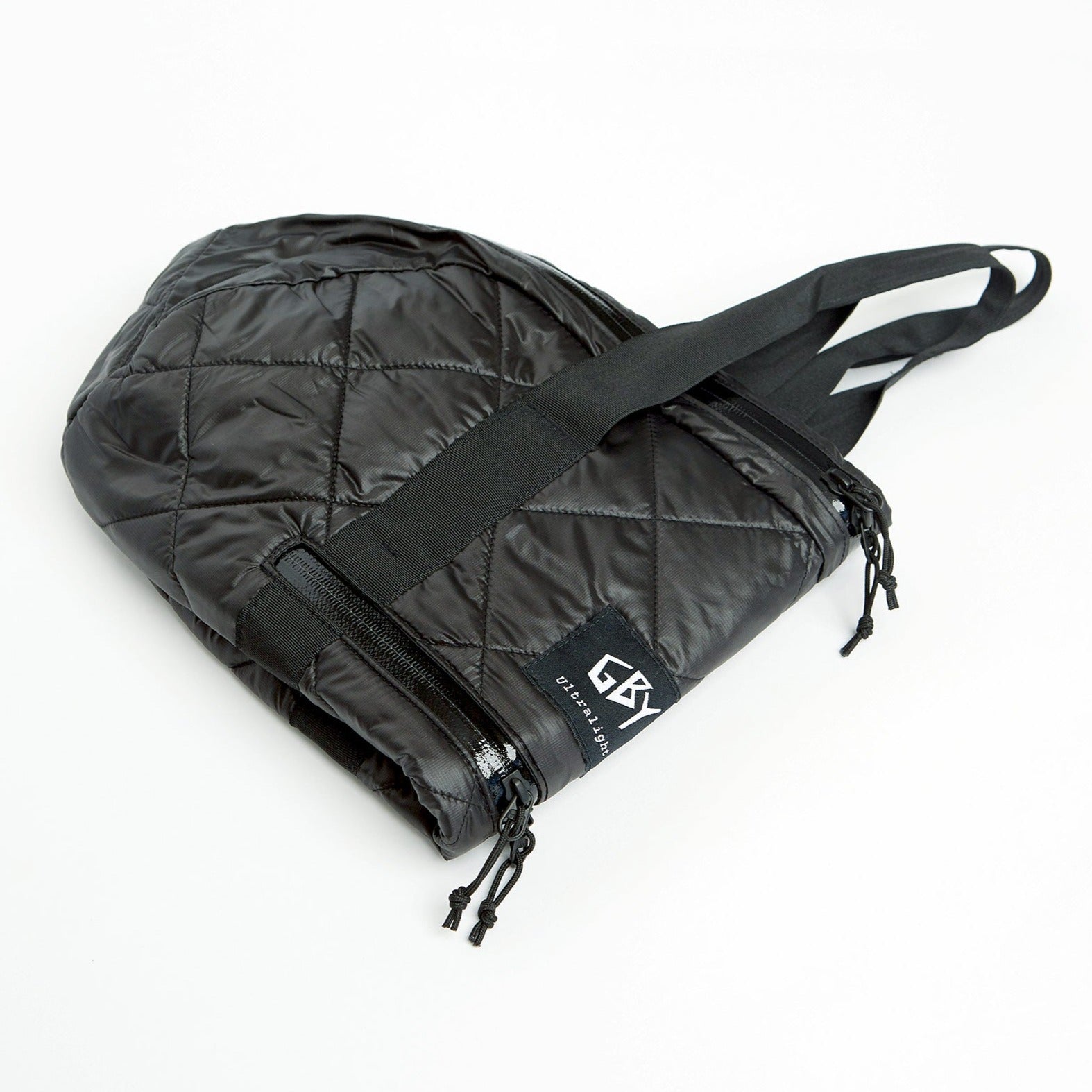 color: black ~ alt: GBY Ultralight - Quilted Gym Duffel Bag Folded 3/4 View